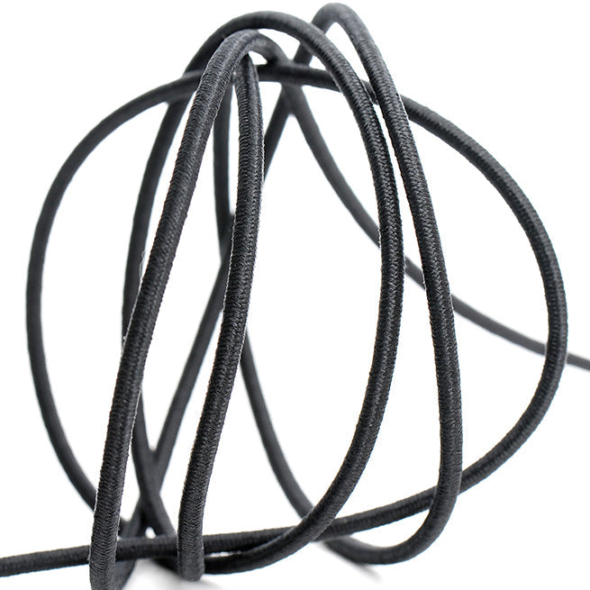 CORDON ELASTICO REDONDO NEGRO/BLANCO (25 MTRS)