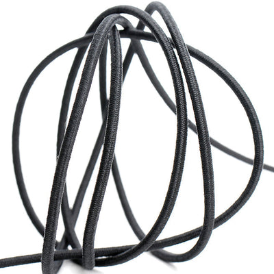 CORDON ELASTICO REDONDO NEGRO/BLANCO (25 MTRS)