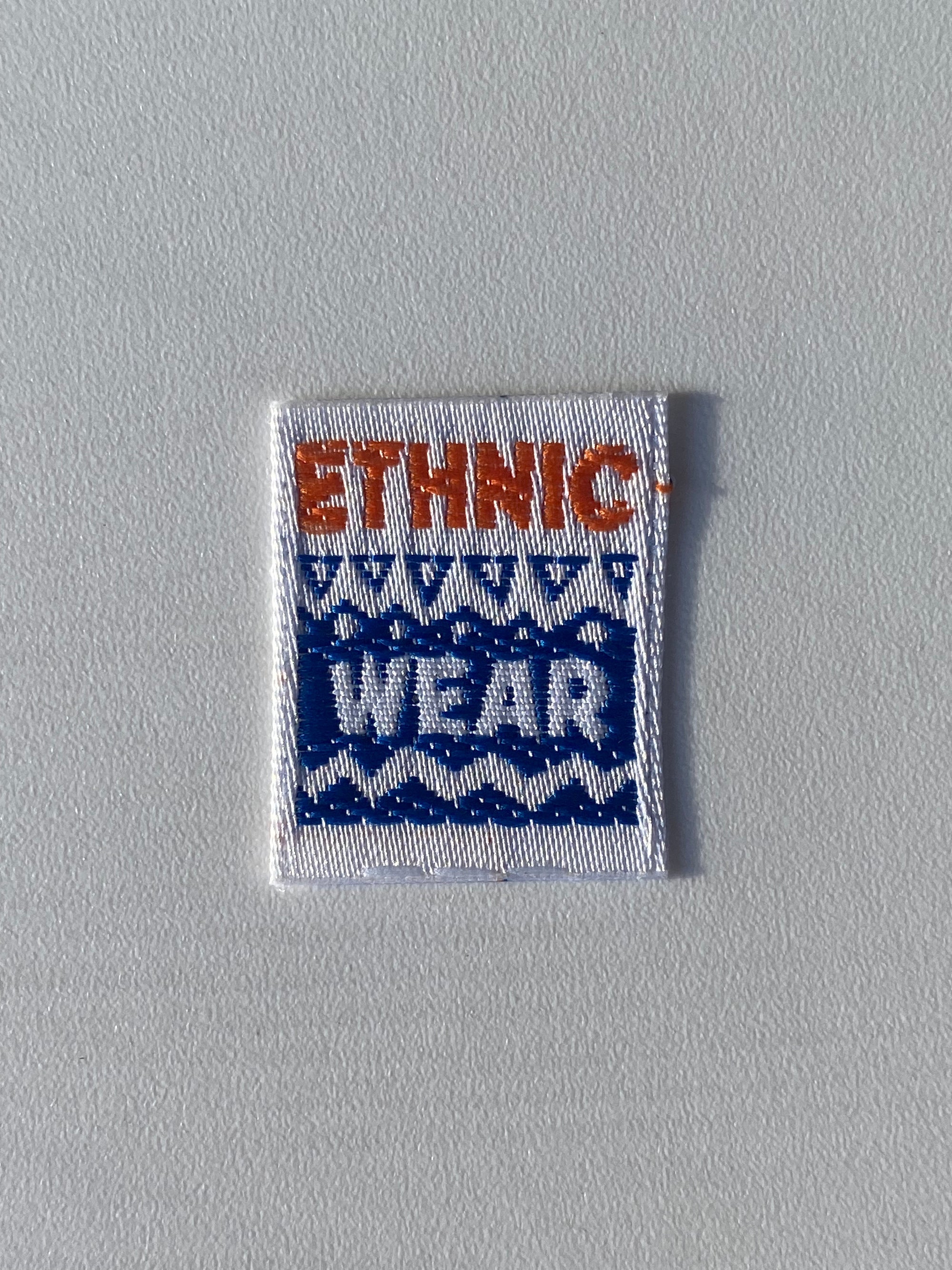 Etiqueta termoadhesiva tejida ETHNIC WEAR