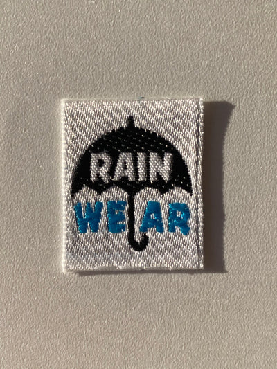 Etiqueta termoadhesiva tejida RAIN WEAR