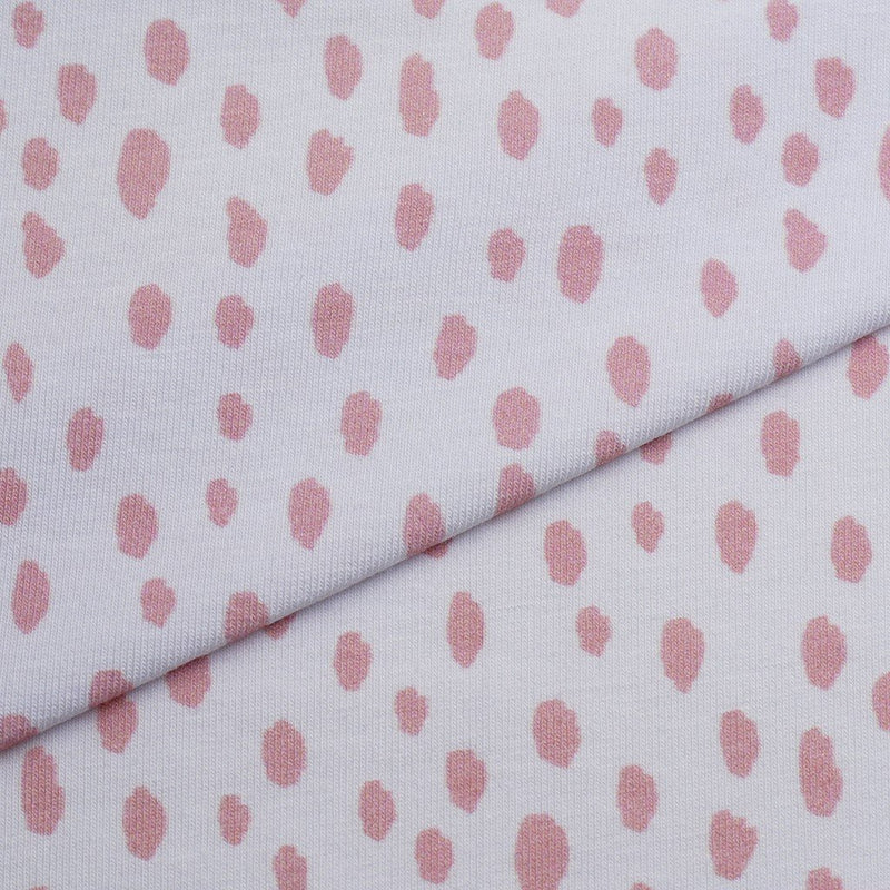 Tela punto estampado manchas
