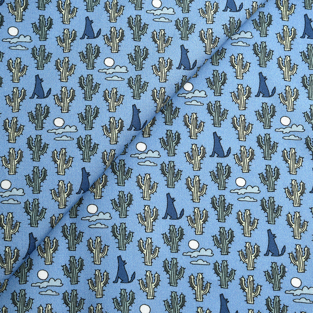 Tela 100% algodón estampado cactus y coyotes (6 MTRS)