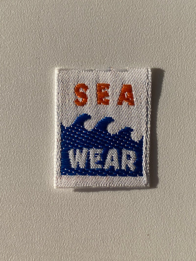 Etiqueta termoadhesiva tejida SEA WEAR